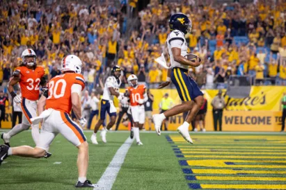 Michael Hawkins Jr.'s 5 total touchdowns lead WVU football to upset win over No. 25 Virginia
